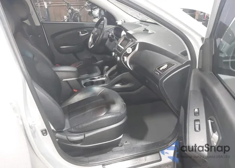 2013 Hyundai Tucson Limited z USA, uszkodzony, nr VIN KM8JUCAC3DU774823